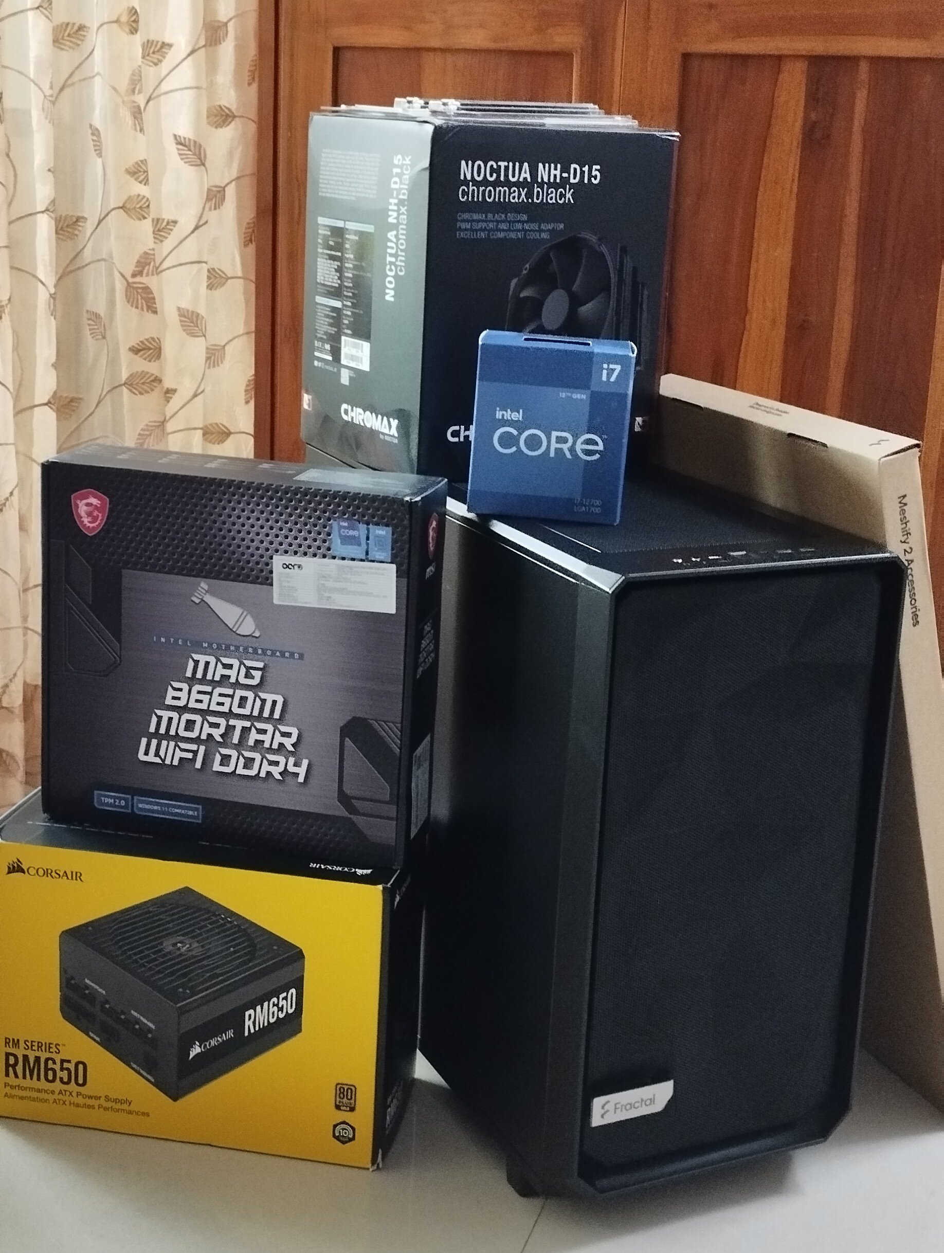 A photograph of all the components of my Personal computer ready to be assembled.